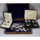 A cased set of six Norwegian 925S and enamelled coffee spoons, a cased set of six silver teaspoons