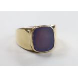 A modern 9ct gold and chalcedony set signet ring, size R, gross weight 15.8 grams.