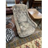 A Victorian walnut upholstered armchair, width 78cm, depth 110cm, height 94cm