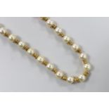 A mid 20th century Italian 750 yellow metal and cultured pearl set single strand necklace, with