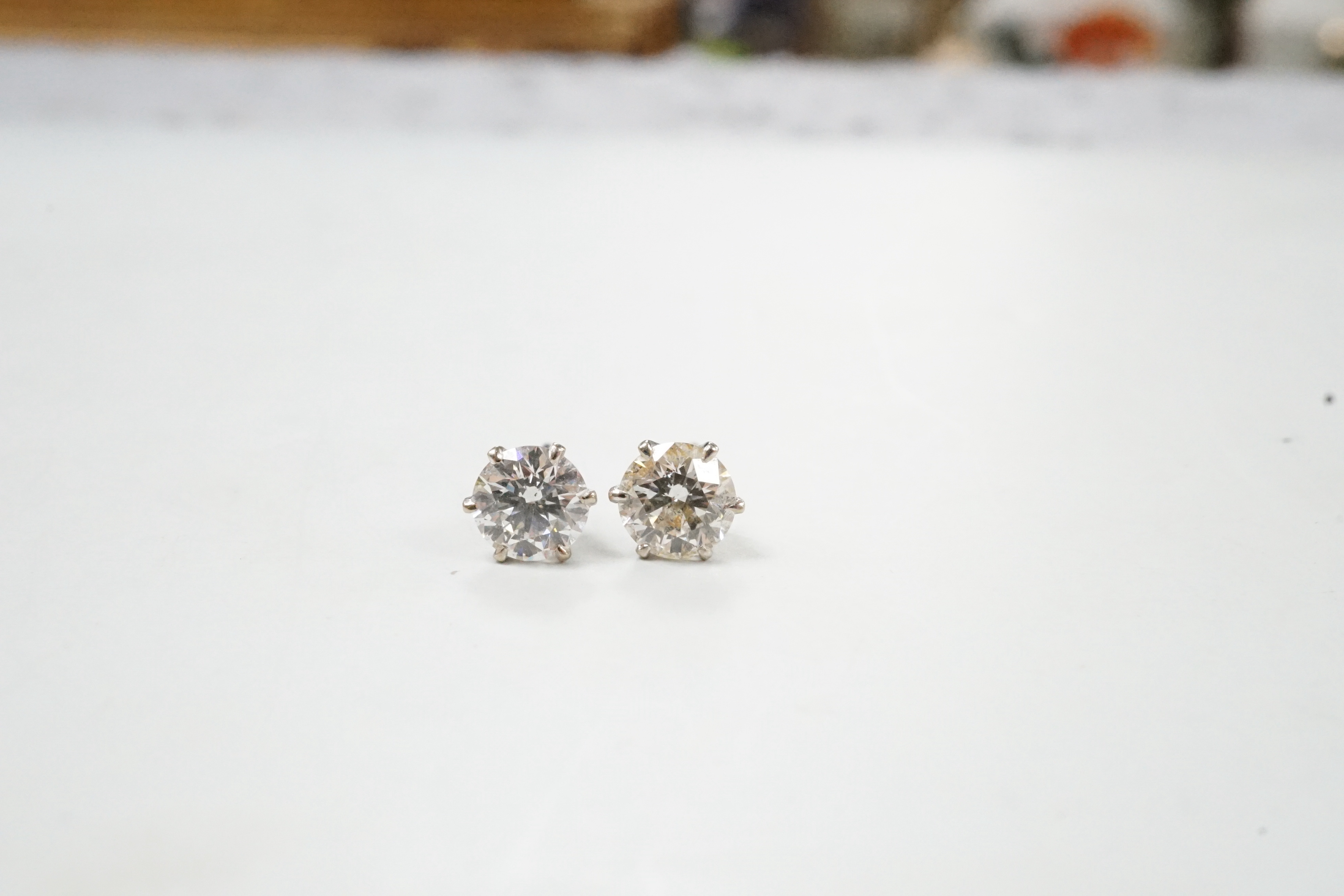 A pair of white metal and solitaire diamond set ear studs, each stone measuring approx. 5.2mm in - Image 2 of 3