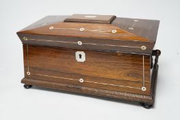 A William IV mother of pearl inlaid rosewood tea caddy, 31cm wide