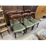 A set of six Victorian mahogany dining chairs, on turned fluted legs
