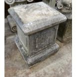 Three reconstituted stone garden plinths, largest width 40cm, height 50cm