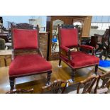 A pair of late Victorian carved mahogany upholstered salon chairs, one with arms, width 70cm,