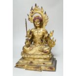 A large Sino-Tibetan gilt bronze figure of Fudo Myob (Acala), 44cm high