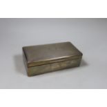 A George V part engine turned silver mounted rectangular cigarette box, London, 1918, 18cm.