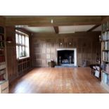 Oak panelling formerly in the library at Plumpton Place, as fitted to three walls in the room