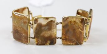 A late Victorian 9ct mounted six stone agate set bracelet, approx. 16cm, gross weight 49 grams.