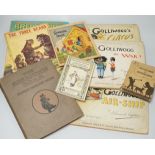 Mixed children's books, a pack of old postcards and three golly books by Francis Upton