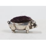 An Edwardian novelty silver pin cushion, modelled as a pig, Levy & Salaman, Birmingham, 1902, length