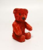 A red Schuco perfume bear, c.1920s, 5in., in excellent condition, missing stopper