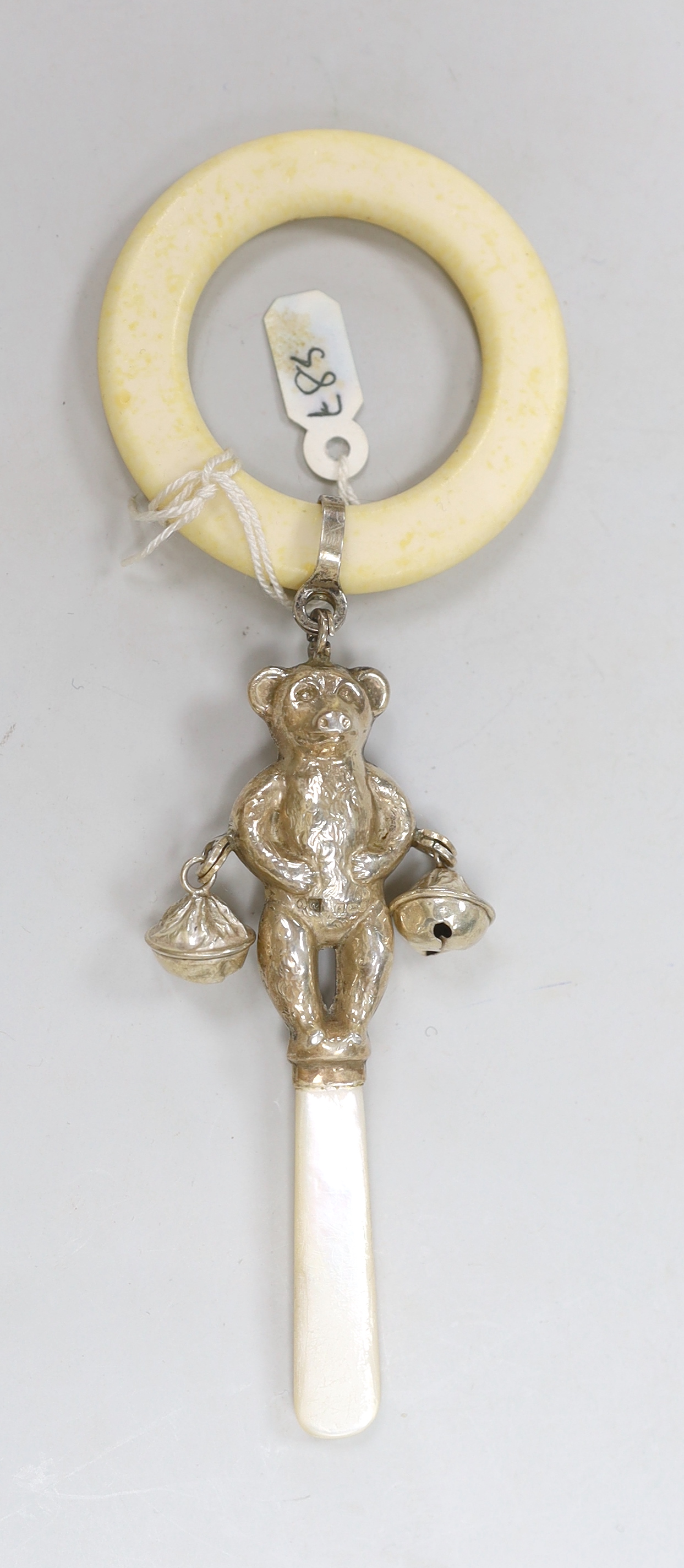 Two Edwardian hat pins with silver hallmarked teddy bea tops, and a silver 1960's teddy bear rattle - Image 4 of 9