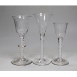 Three George III DSOT stem wine glasses, tallest 17.5cm high