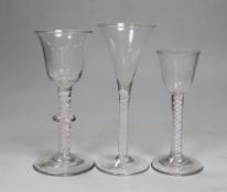 Three George III DSOT stem wine glasses, tallest 17.5cm high