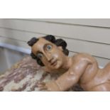 A painted figural carving, reputedly from a fun fair game, 88cm high