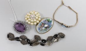 A small group of assorted costume jewellery including marcasite necklace, amethyst paste brooch,