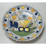 An 18th century Delftware charger, 35cm diameter