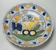 An 18th century Delftware charger, 35cm diameter