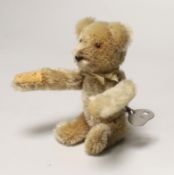 A Schuco tumbling bear with key, c.1950. 5in., excellent condition
