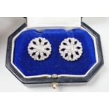 A pair of pierced white metal and diamond set circular cluster earrings, diameter 17mm, with 925