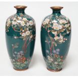 A small pair of Japanese silver wire cloisonné enamel green ground vases, early 20th century, 14cm