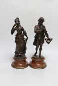 Karl Sterrer (1844-1918. A pair of bronze figures of a lady and gentlemen in 18th century dress,