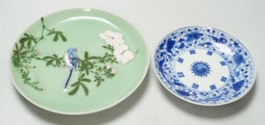A Japanese celadon ground dish and a Chinese blue and white dish, largest 22cm diameter