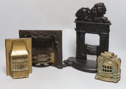 A Victorian cast iron model firegrate, a cast brass model firegrate and a similar stove, tallest
