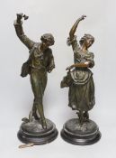 A pair of late 19th century spelter ‘dancing’ figures, tallest 49cm