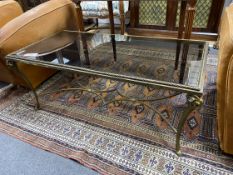 A mid century rectangular gilt metal ram's head glass top coffee table, width 104cm, depth 51cm,