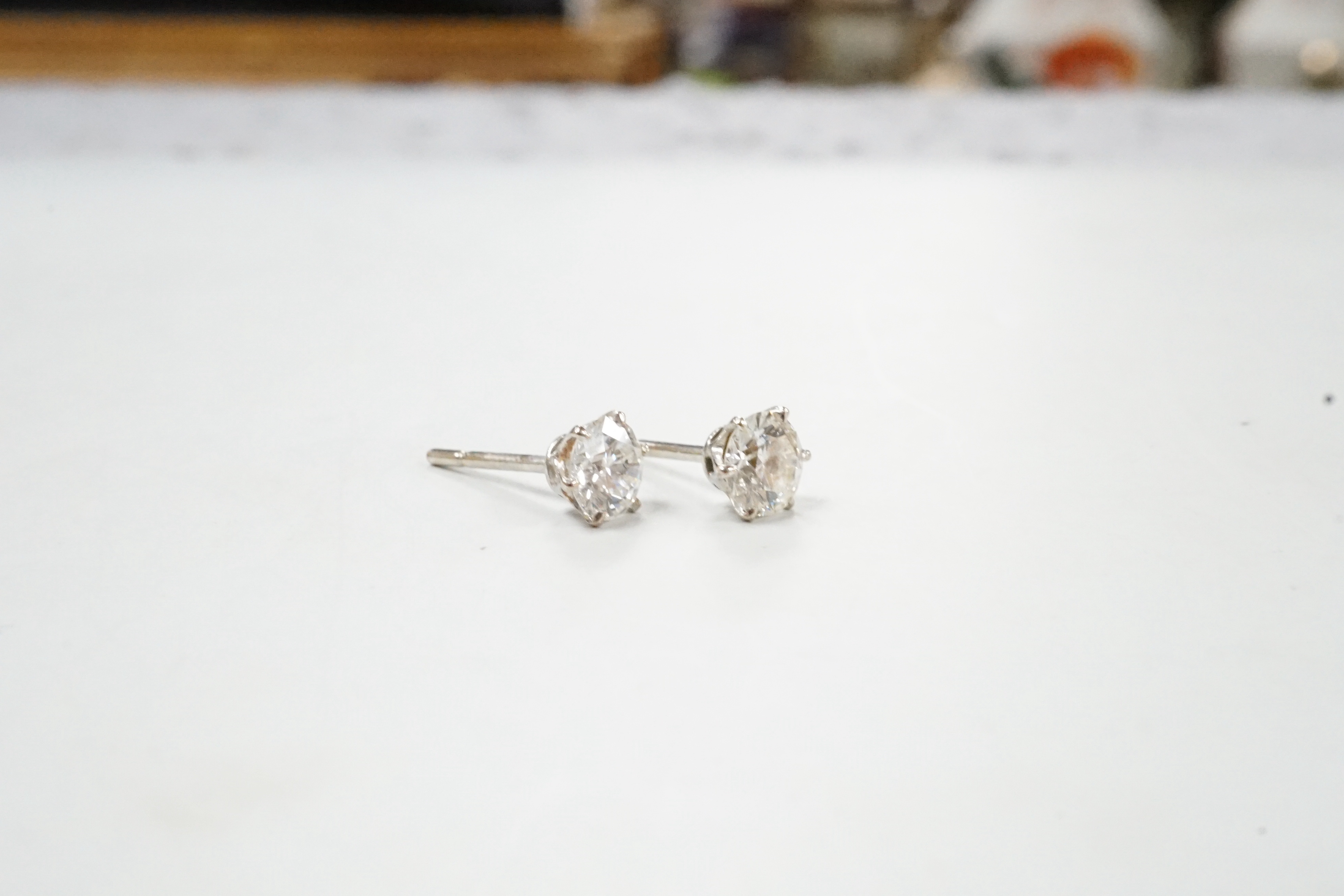 A pair of white metal and solitaire diamond set ear studs, each stone measuring approx. 5.2mm in - Image 3 of 3