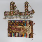 19th and 20th century textiles: An Indian mirrored and patchwork bag, a smaller embroidered bag,