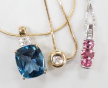 Three assorted modern 9ct gold and gem set pendant necklaces, including blue topaz and diamond chip,