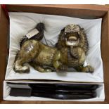 A massive Chinese soapstone figure of a lion-dog, 43cm wide (excl. stand), boxed