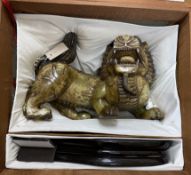 A massive Chinese soapstone figure of a lion-dog, 43cm wide (excl. stand), boxed