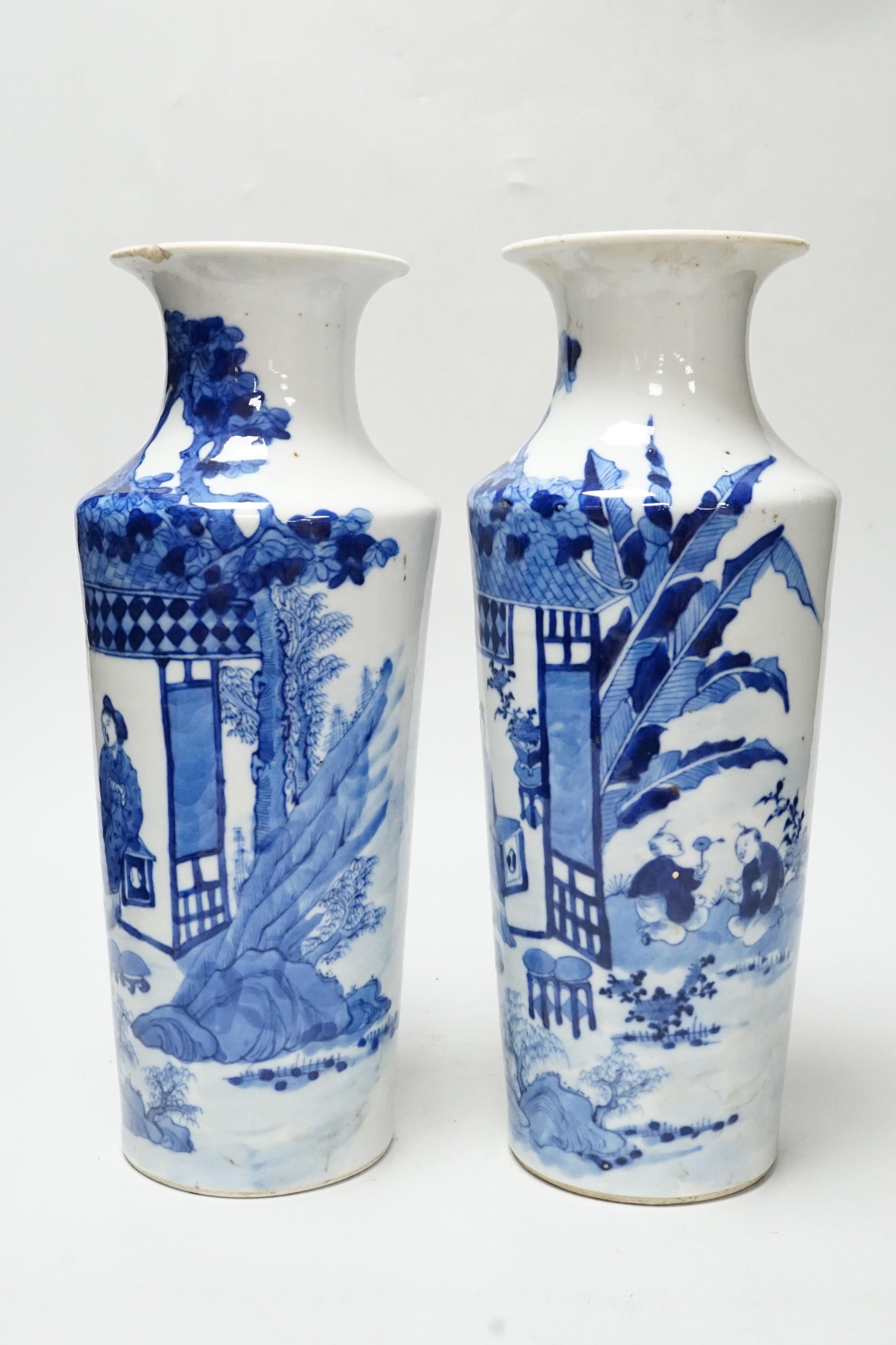 A pair of late 19th century Chinese blue and white vases, 31cm - Image 2 of 5