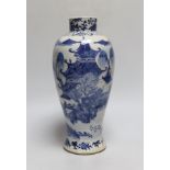 A 19th century Chinese blue and white vase, 27cm