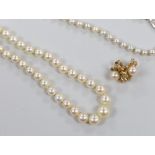 A single strand graduated cultured pearl necklace with 9ct clasp, 50cm and a pair of 375 and