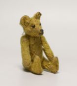 A Steiff Mini bear, c.1915, no button, 4in.