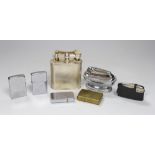 A Dunhill plated table lighter and six various other lighters, Dunhill table lighter 10cm high