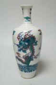 A Chinese ‘dragon’ bottle vase, 23cm