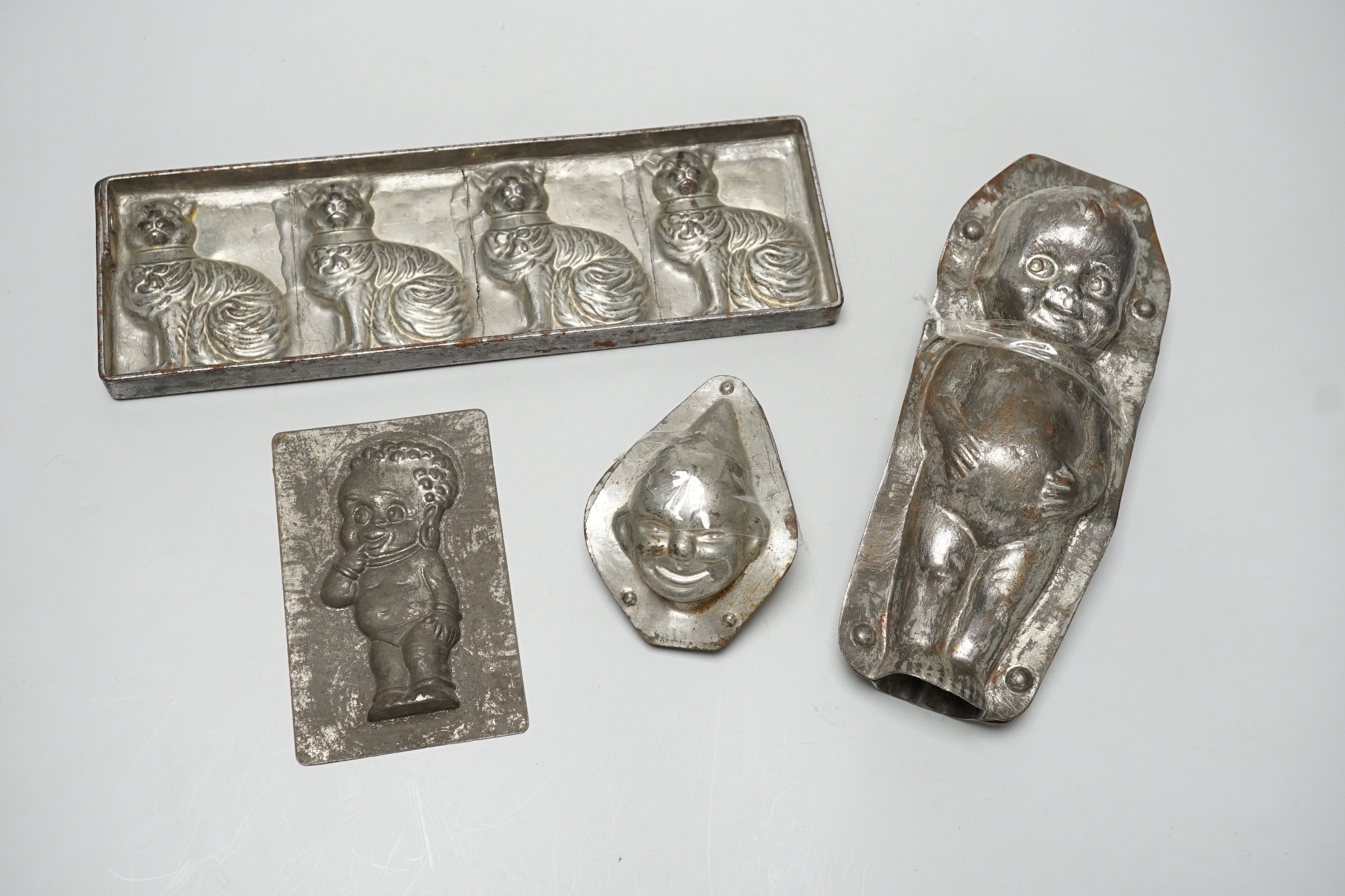 Four chocolate mould tins: a cat, a kewpie and two others - Image 6 of 15