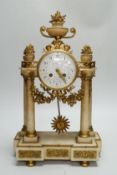 A late 19th century French alabaster and ormolu mounted mantel clock by Le Roy & Fils, key and