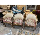 A set of three Edwardian mahogany tub chairs, with show-wood frames and shell carved cabriole legs