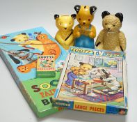 Three Sooty money boxes and two Sooty games and cards