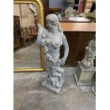 A reconstituted stone garden statue of a lady holding a floral garland, height 125cm