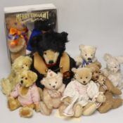 A Merrythought teddy and golly, boxed, with five artist's bears