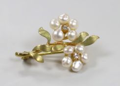 A modern 9ct gold, cultured pearl and diamond cluster set twin flower head brooch, 29mm, gross