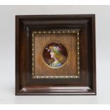 Clement Limoges: An Arts and Crafts enamelled circular plaque, of pre-Raphaelite girl, framed,
